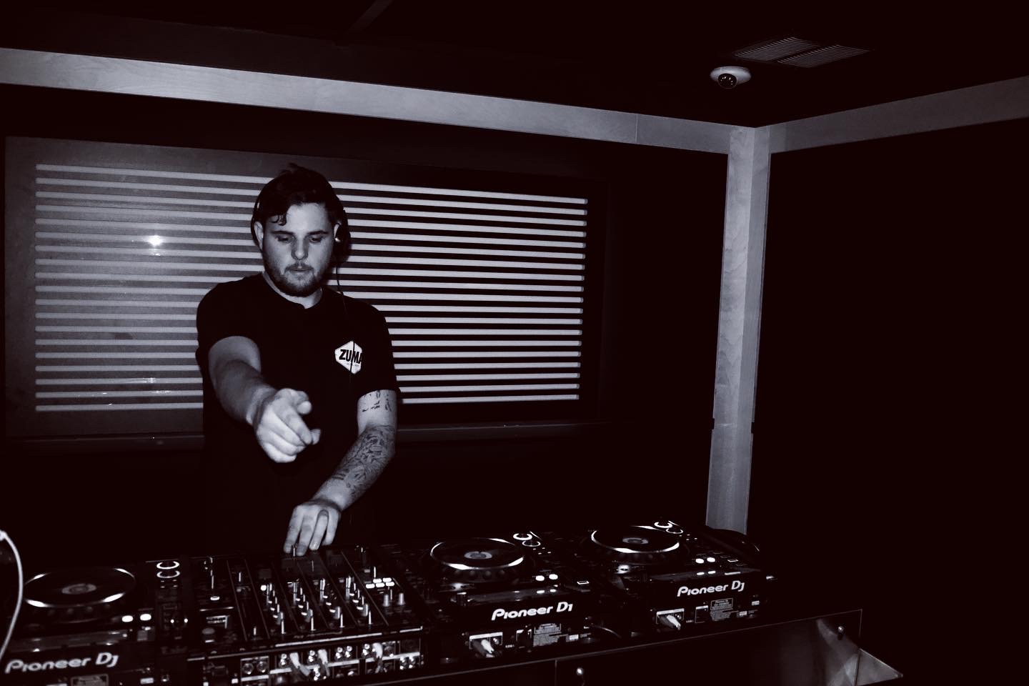 Saint Row DJ in professional studio with Pioneer DJ equipment